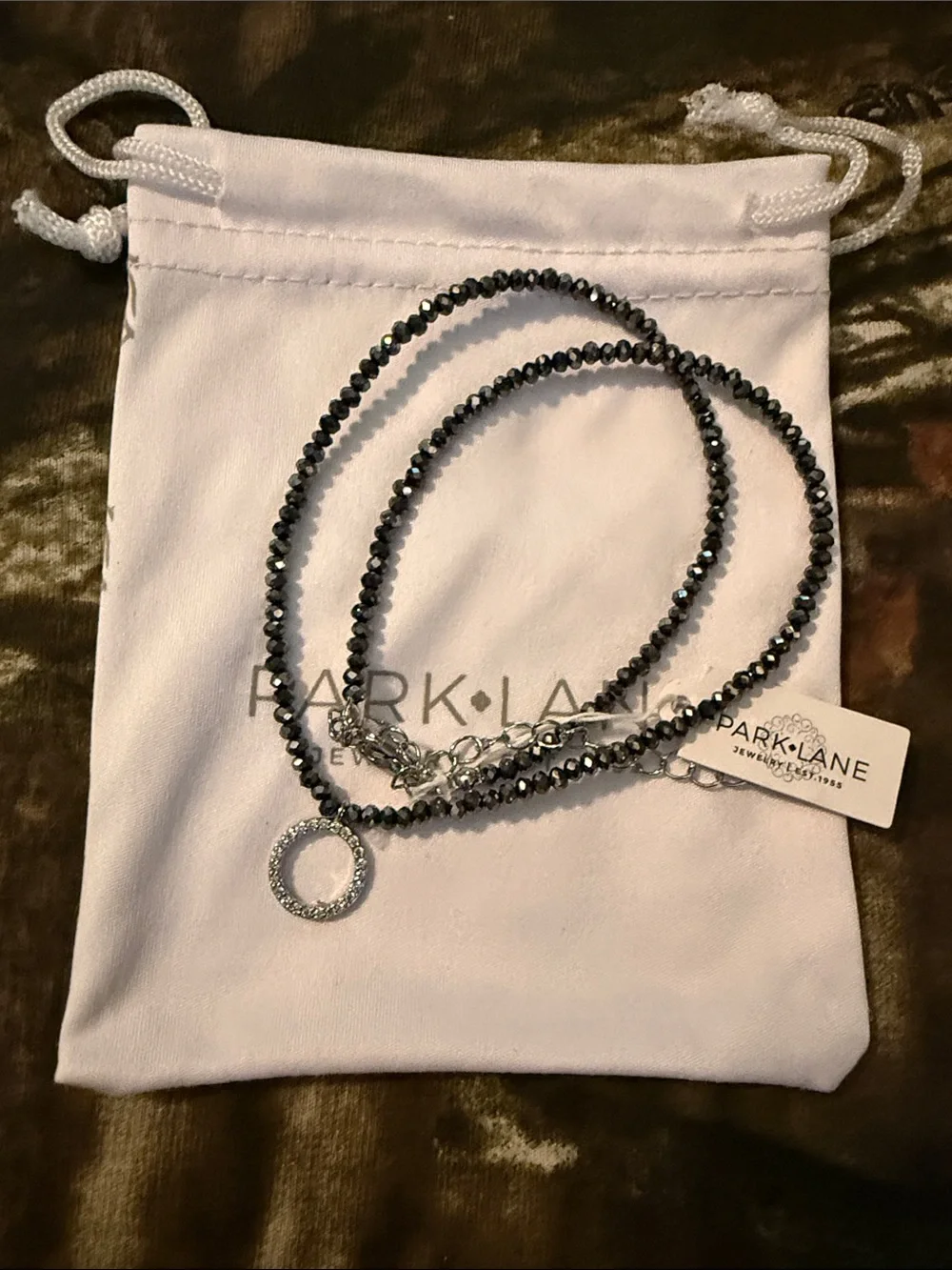 PARK LANE Hematite-Tone Faceted Bead Necklace with Crystal Circle Charm